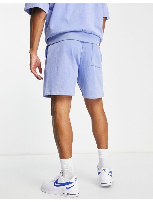 ASOS DESIGN relaxed shorts in blue acid wash