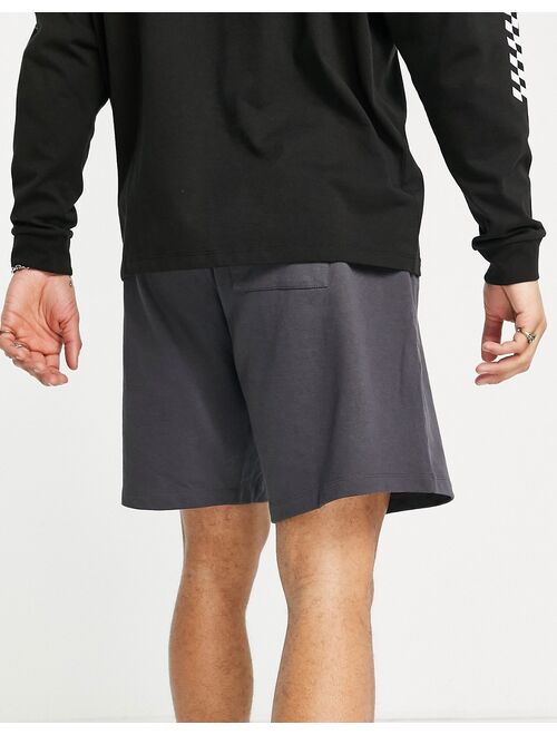 ASOS DESIGN oversized jersey shorts in washed black