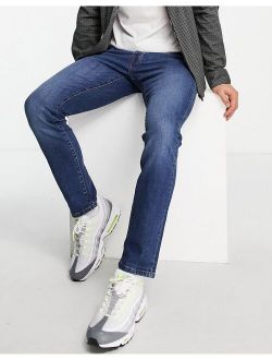 stretch slim jeans in mid wash