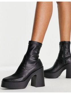 Elsie high heeled sock boot in black PU