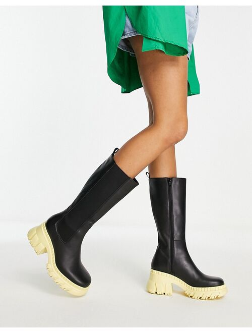 ASOS DESIGN Capricorn premium leather chunky Chelsea knee boots in black with yellow sole