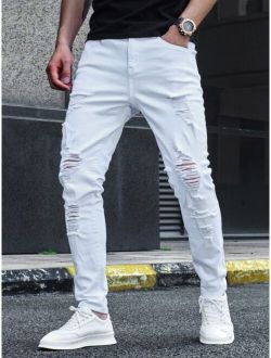 Men Solid Ripped Tapered Jeans