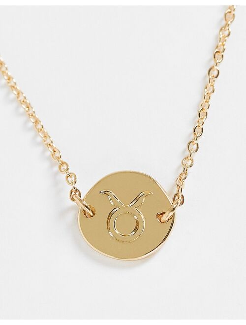 ASOS DESIGN bracelet with Taurus zodiac charn in gold tone
