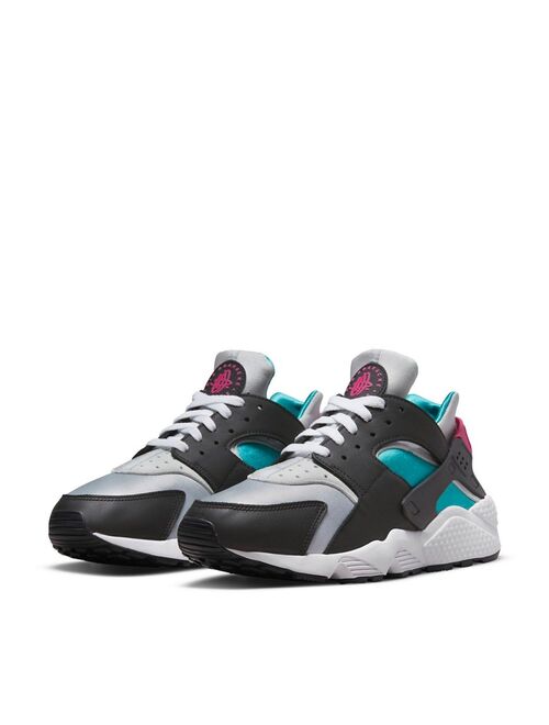 Nike Air Huarache sneakers in black/new emerald