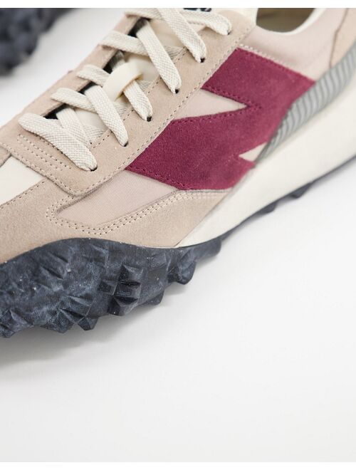 New Balance XC72 sneakers in beige and red