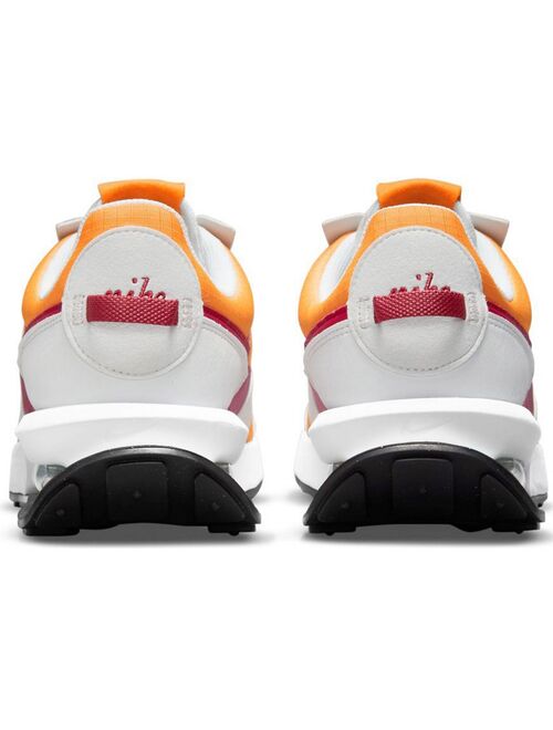 Nike Air Max Pre-Day sneakers in kumquat/pomegranate