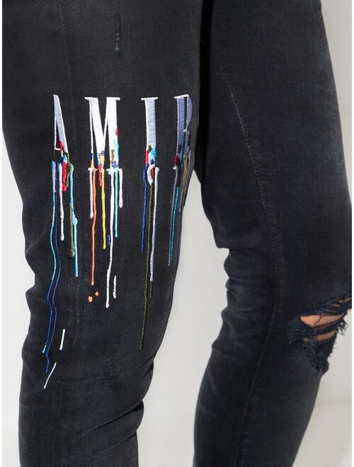 AMIRI logo-embroidered skinny jeans