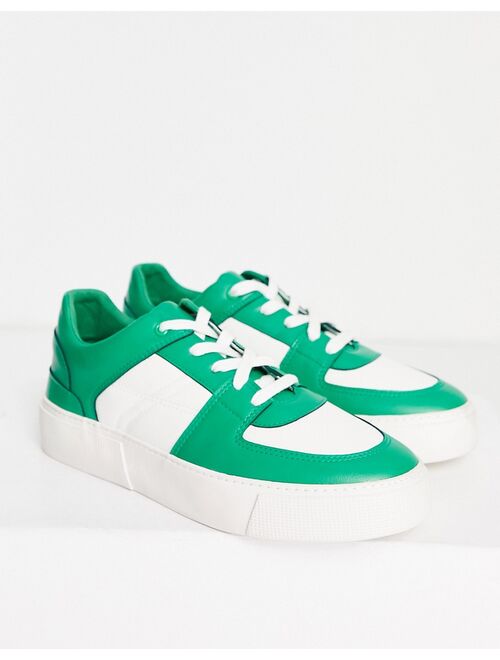 ASOS DESIGN faux leather retro sneakers in green/white