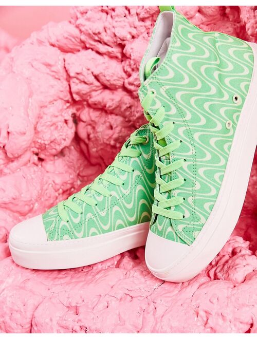 ASOS DESIGN lace up canvas sneakers in green print with chunky sole