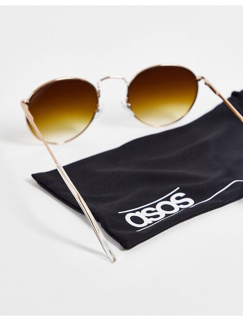 ASOS DESIGN metal round sunglasses in gold with brown lens