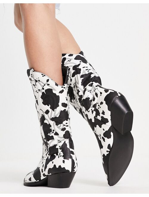 ASOS DESIGN Andi flat western boots in cow print