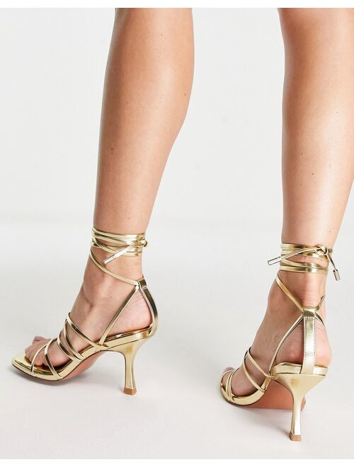 ASOS DESIGN Wide Fit Hiccup strappy tie leg mid heeled sandals in gold