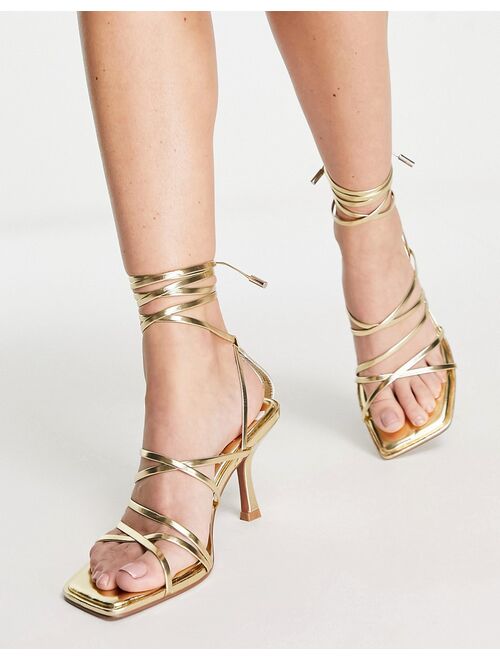 ASOS DESIGN Wide Fit Hiccup strappy tie leg mid heeled sandals in gold