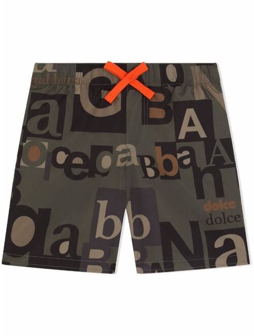 Dolce & Gabbana Kids all-over typeface logo shorts