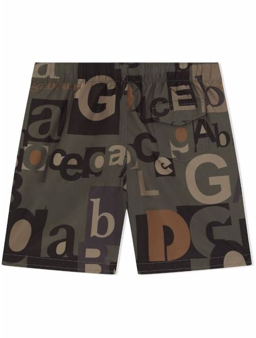 Dolce & Gabbana Kids all-over typeface logo shorts