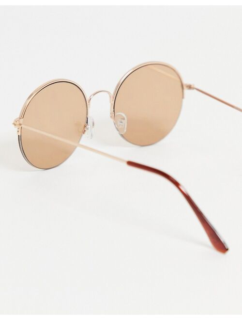 ASOS DESIGN 70s round sunglasses in gold with light brown lens