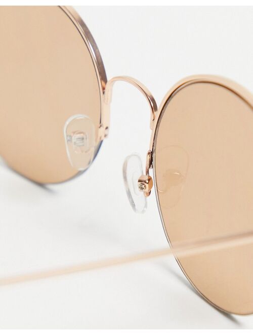 ASOS DESIGN 70s round sunglasses in gold with light brown lens