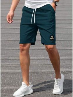 Men Coconut Tree Letter Graphic Drawstring Waist Shorts