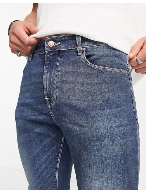 ASOS DESIGN spray on jeans with power stretch in dark wash blue