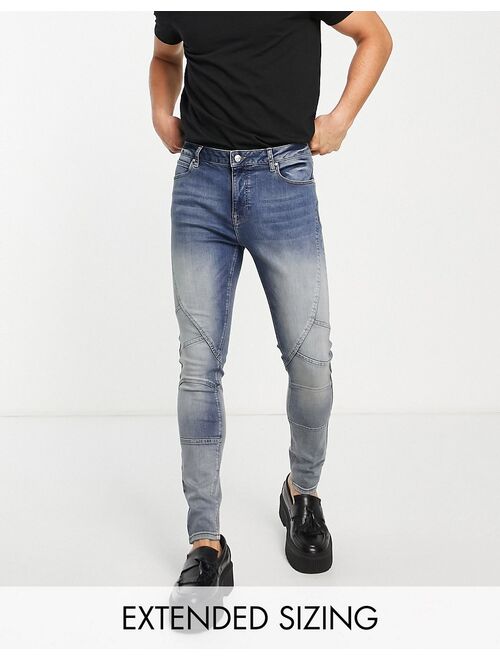 ASOS DESIGN spray on jeans with power stretch in mid tint wash with moto detail