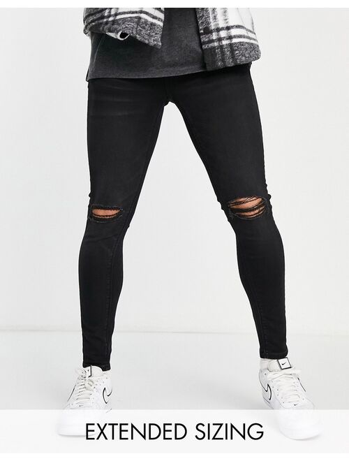 ASOS DESIGN spray-on jeans in power stretch in black with busted knee