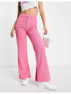 tailored pants with split hem in pink