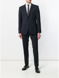 buttoned up formal suit