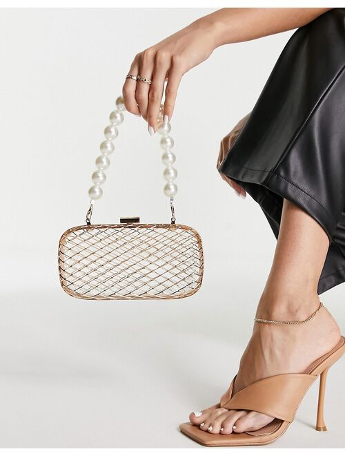 ASOS DESIGN caged clutch bag with pearl beaded handle in gold