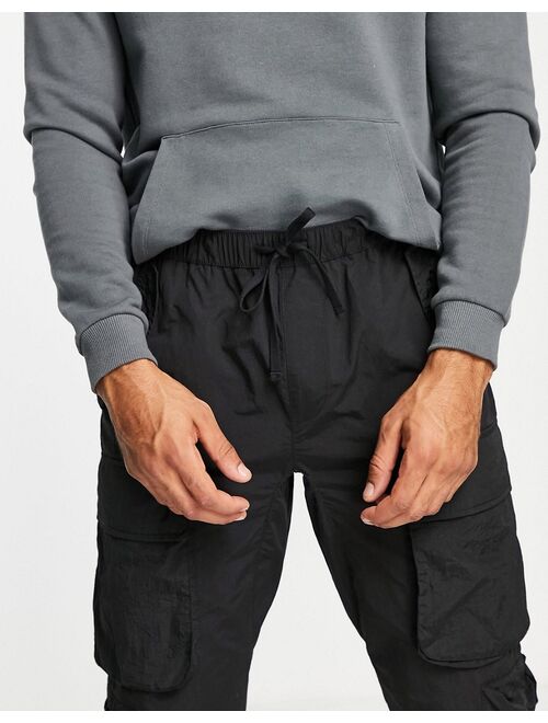 Topman relaxed nylon multi pocket cargo pants in black