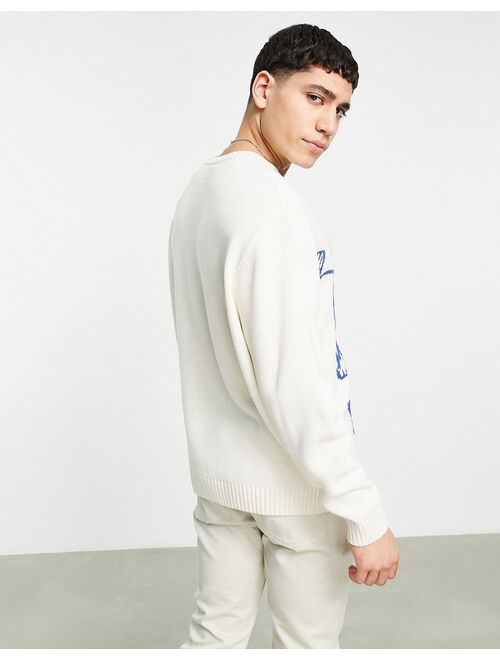 ASOS DESIGN knitted oversized sweater with YALE design in stone