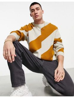 knitted sweater with spliced stripe design
