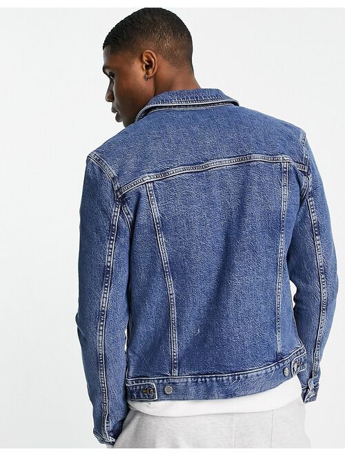 ASOS DESIGN skinny denim jacket in mid wash blue