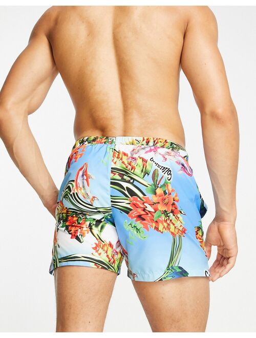 COLLUSION tropical print shorter length swim shorts in multi