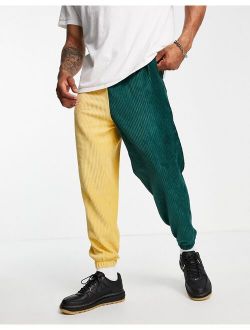 set oversized sweatpants in dark green ribbed velour color block