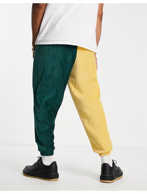 ASOS DESIGN set oversized sweatpants in dark green ribbed velour color block