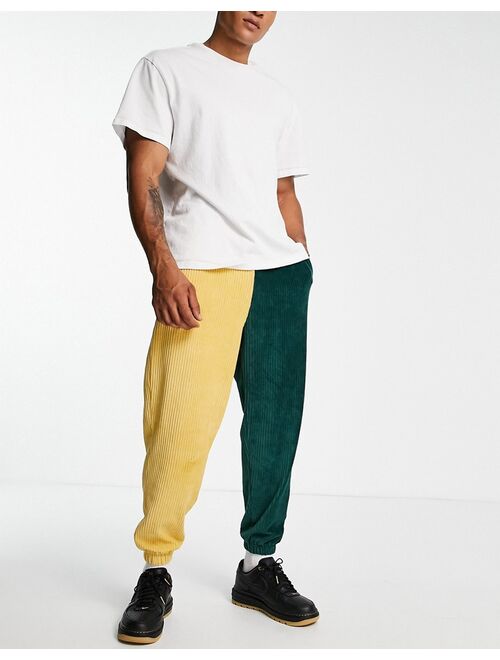 ASOS DESIGN set oversized sweatpants in dark green ribbed velour color block