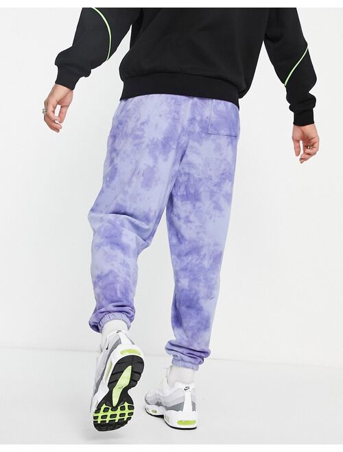 ASOS DESIGN oversized sweatpants in purple tie dye