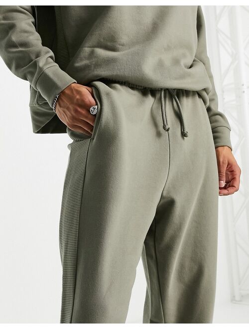 ASOS DESIGN oversized sweatpants with ribbed panels in green - part of a set