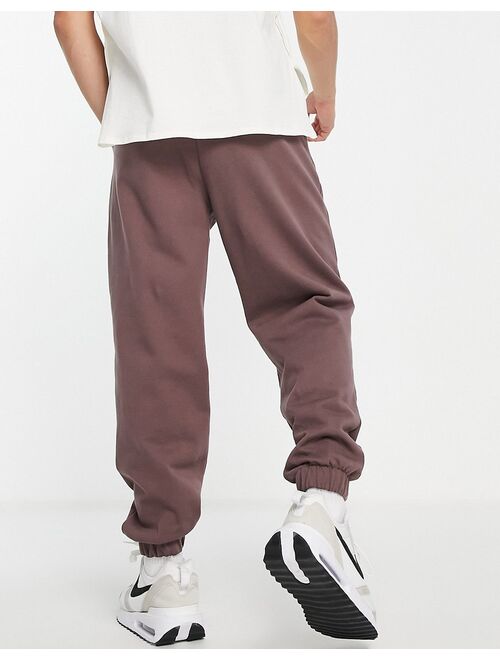 ASOS DESIGN oversized sweatpants in washed brown