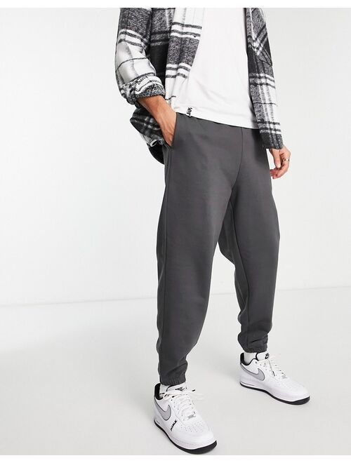 ASOS DESIGN heavyweight oversized sweatpants in washed black