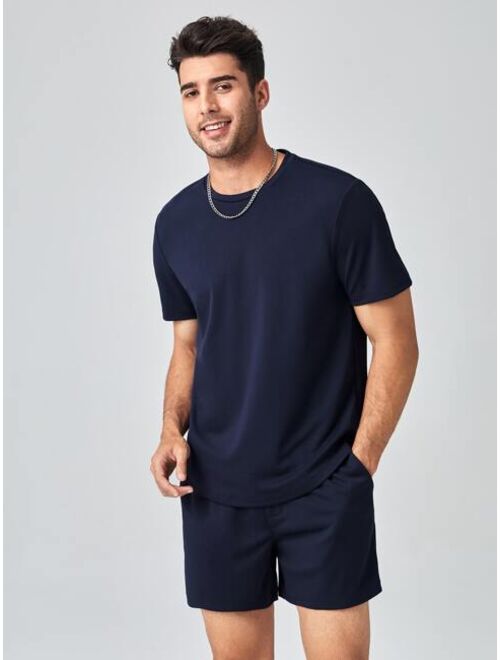 SHEIN Men Solid Tee And Drawstring Waist Track Shorts Set