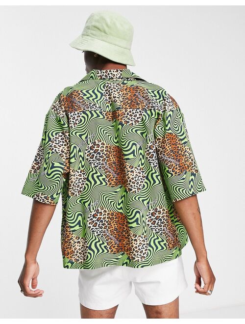 COLLUSION Unisex leopard print short sleeve revere shirt in multi