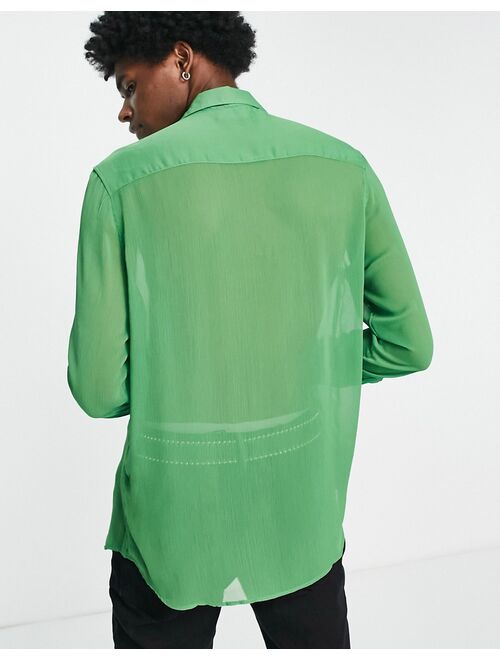 ASOS DESIGN regular sheer shirt with ruffle front in green