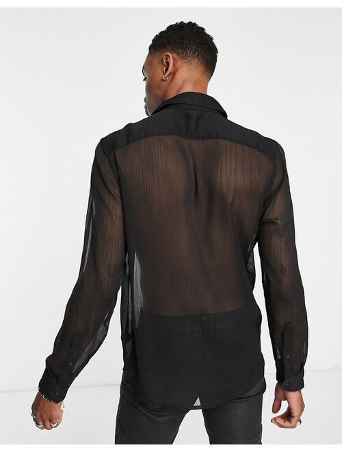 ASOS DESIGN regular sheer shirt with ruffle front detail in black