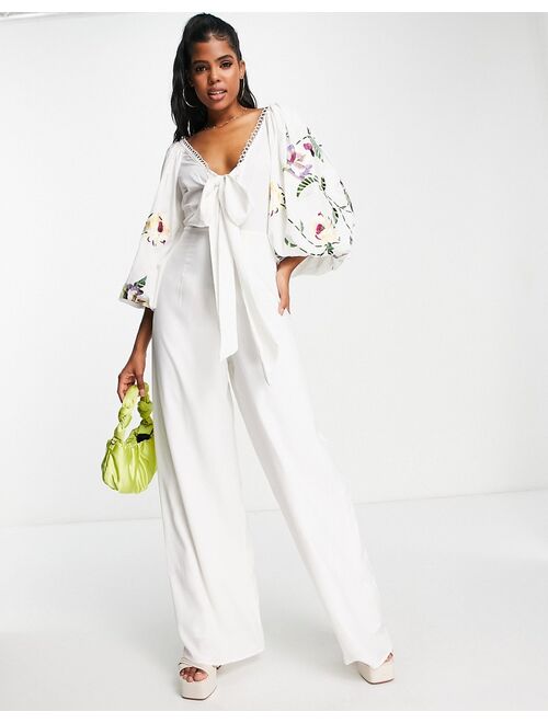 ASOS DESIGN occasion big sleeve tie front wide leg jumpsuit with embroidery