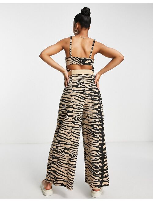 ASOS DESIGN corset wide leg jumpsuit with wicker belt in zebra print