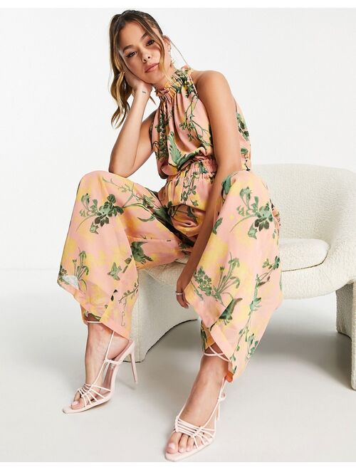 ASOS DESIGN maternity chiffon gathered waist halter jumpsuit in floral print