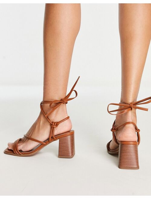 ASOS DESIGN Hollow strappy tie leg mid heeled sandals in tan