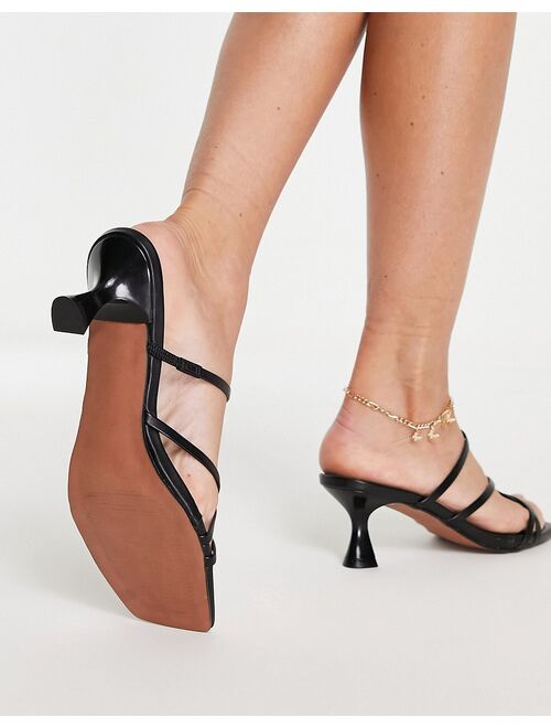 ASOS DESIGN Wide Fit Hart strappy mid heeled mules in black