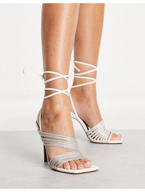 ASOS DESIGN Nest embellished strappy tie leg heeled sandals in off white